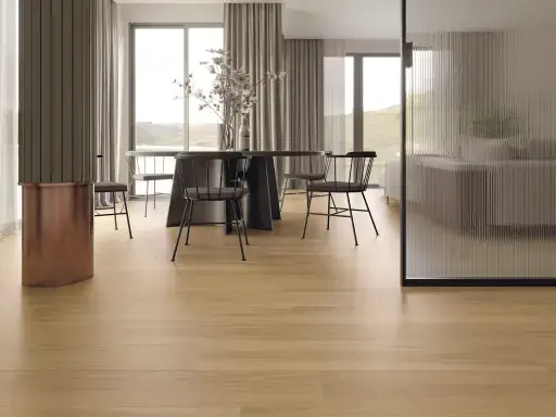 Modern dining room with large windows, light wood-look floor, black chairs around a table and a glass partition.